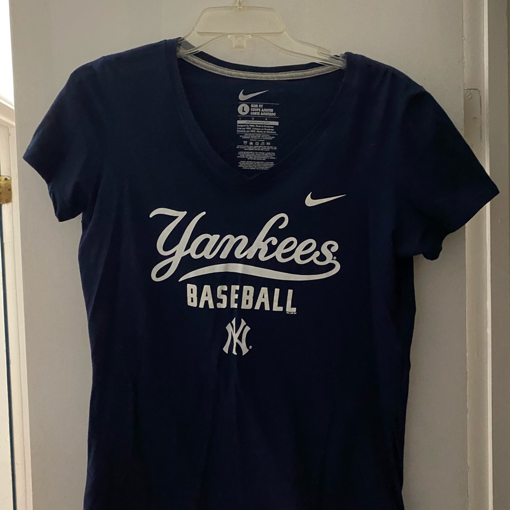 Two Sports T’s ($20 each, $35 together)